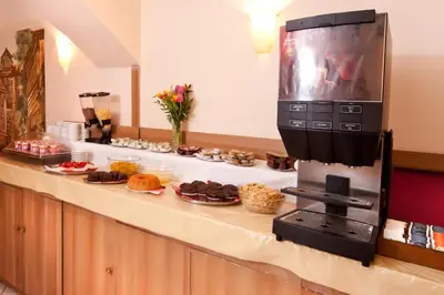 a counter with aasteryasteryasteryasteryasteryasteryasteryasteryasteryasteryasteryastery at Hotel Residence Select in Prague