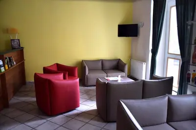 a waiting room with two chairs and a table at Hotel Residence Select in Prague
