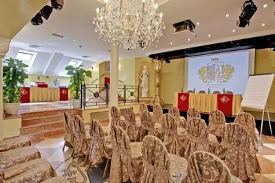 a conference room with chairs and a chandelier at Alchymist Grand Hotel and Spa in Prague