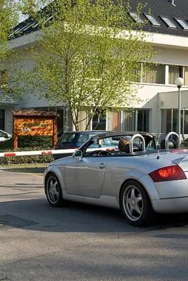 a dog sitting in the back seat of a car at Hotel Michael in Prague