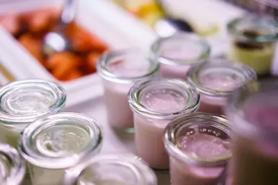 a group of mason jars filled with pink liquid at Esplanade Hotel Prague in Prague