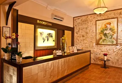 a reception area of a hotel with a reception desk at Hotel Praga 1 in Prague