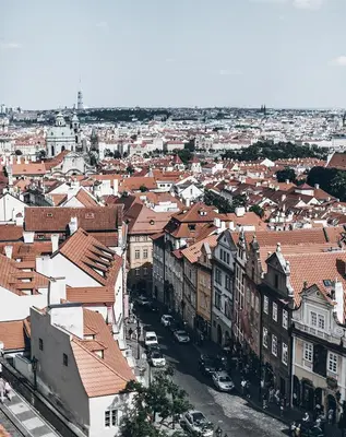 an aerial view of a city with buildings and cars at Design Hotel Neruda in Prague