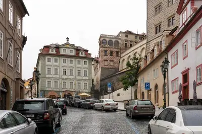 a city street with cars parked on the street at Boutique Hotel Green Lobster in Prague