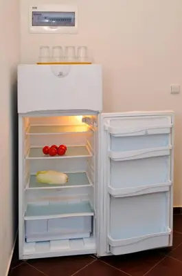 an open refrigerator with food inside of it at Pension Prague City in Prague