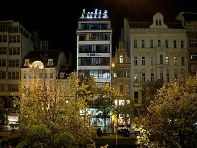 an overhead view of a city at night at EA Hotel Julis in Prague