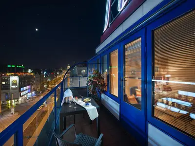 a tall building with large windows on top of it at EA Hotel Julis in Prague