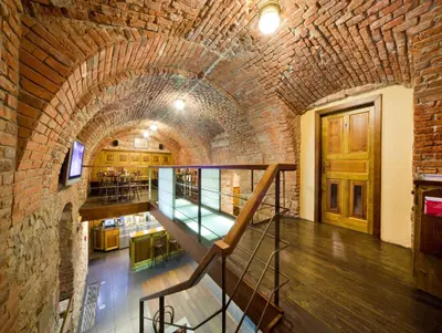 an old brick building with a staircase in it at Prague Inn in Prague