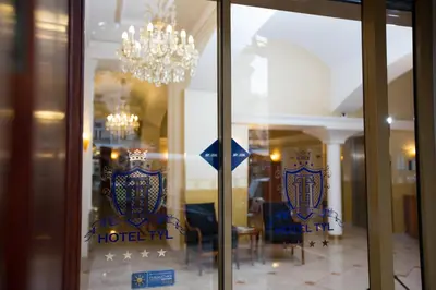 a window of a hotel with a chandelier at Hotel Tyl in Prague