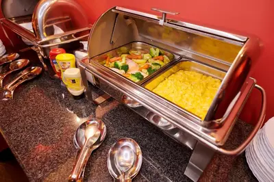 a tray of food on a kitchen counter with spoons at La Boutique in Prague