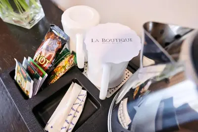 a table with a toothbrush and some toothpaste at La Boutique in Prague