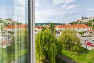 a window with a view of a city at Hotel Klarinn Prague Castle in Prague