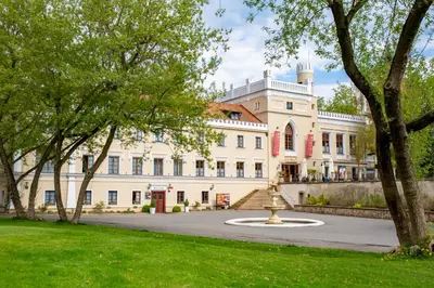 a fountain in front of a building at Chateau St. Havel - Wellness Hotel in Prague