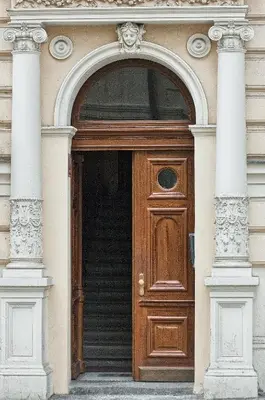an entrance to a building with a wooden door at Residence Masna in Prague