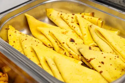 a plastic container filled with tortilla crisps at Hotel Galileo in Prague