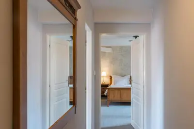 a bathroom with a tub and a toilet and a sink at Monastery Garden Prague in Prague