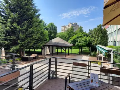 a gazebo with a pavilion in a park at Hotel Duo & Wellness in Prague