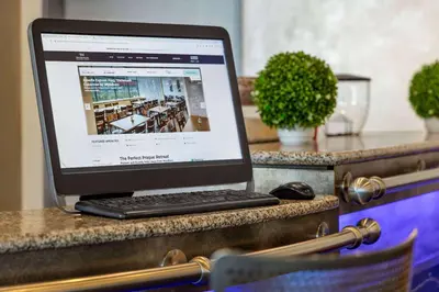 a laptop computer sitting on top of a desk at Amedia Express Prague, Trademark Collection by Wyndham in Prague