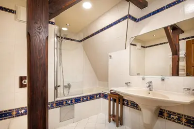 a bathroom with a sink and a shower at Hotel U Prince Prague by BHG in Prague