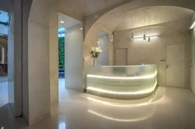a bathroom with a sink and a mirror at Bishop's House in Prague