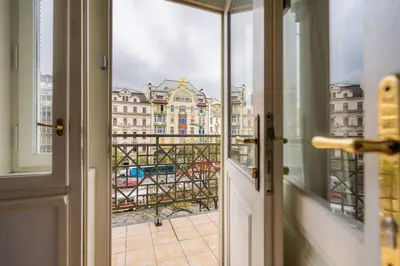 a view of a city from a window at EA ApartHotel Melantrich in Prague