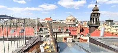 a view of a city from the roof of a building at EA ApartHotel Melantrich in Prague