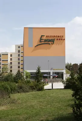 a building with an energy saving sign on it at Rezidence Emmy in Prague