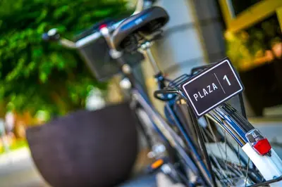 a bike with a sign on the back of it at Plaza Boutique Hotel - Czech Leading Hotels in Prague