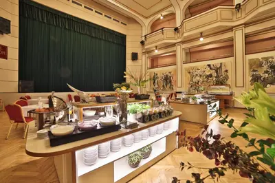a kitchen with a counter with food on it at Hotel Ariston Prague in Prague