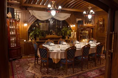 a dining room with a long table and chairs at Admiral Botel in Prague