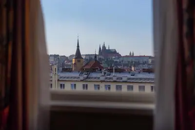 a view of a city from a window at Hotel Liberty in Prague