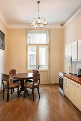 a bedroom with a large bed with a purple blanket at BHG Apartments Prague in Prague