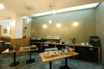 a restaurant with two tables with food on it at U Stare Pani - At the Old Lady Hotel in Prague
