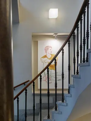 a mural of a woman on a wall at The ICON Hotel in Prague