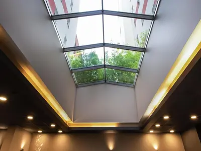 a large window in the ceiling of a building at Ibis Praha Old Town in Prague