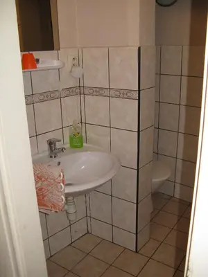a bathroom with a sink and a toilet at Zderaz in Prague