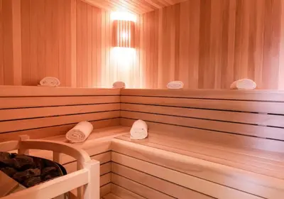 a sauna with white mats on the inside of it at COLORFACTORY SPA Hotel - Czech Leading Hotels in Prague