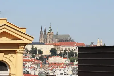 a view of a city with a castle in the background at Amarilis in Prague