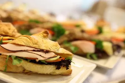 a sandwich on a plate on a table at Amarilis in Prague