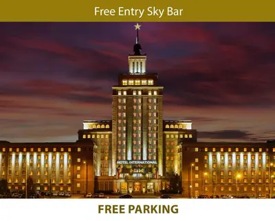 a lit up building with a free entry sky bar at Grand Hotel International - Czech Leading Hotels in Prague