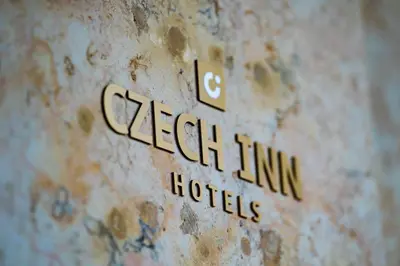 a sign that says cecilim link hotel on a wall at Grand Hotel International - Czech Leading Hotels in Prague