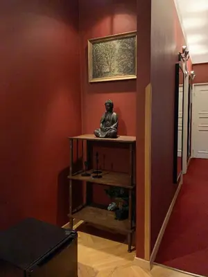 a room with a statue sitting on a table at Small Luxury Palace Residence in Prague