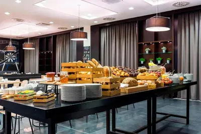 a buffet of fruits and vegetables on a table at Courtyard by Marriott Prague Airport in Prague
