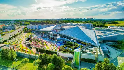 an aerial view of a city with a amusement park at Aquapalace Hotel Prague in Čestlice
