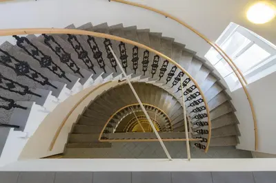 a spiral staircase in a building at Exe City Park Hotel in Prague