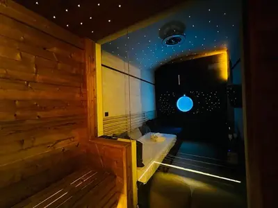 a room with a sauna with a bench in it at SPA SPA Letná in Prague