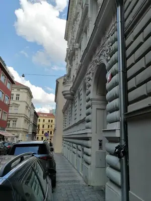 a building with a door on the side of a street at Charles Square Prague Apartment in Prague