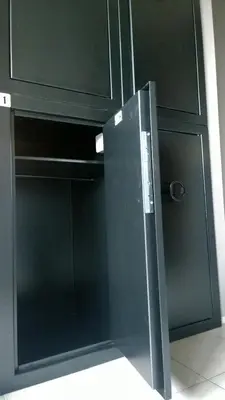 a black refrigerator with a glass door in a kitchen at NEW GENERATION HOSTEL Prague center in Prague