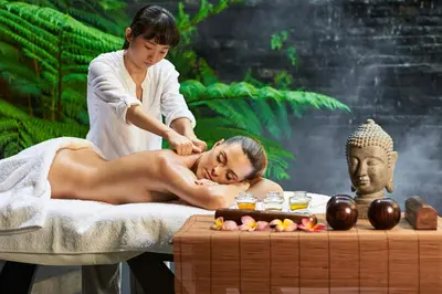 a woman getting a massage from aitating woman in a spa at Hostel V38 in Prague