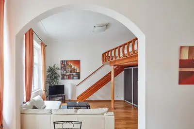 a building on the corner of a city street at Prague Days - One-bedroom Apartment with Balcony and Elevated Chill Zone in Old Town in Prague